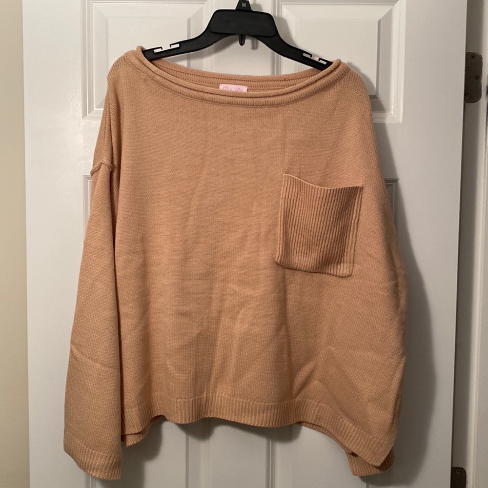 Pink Lilly tan crew neck sweater.